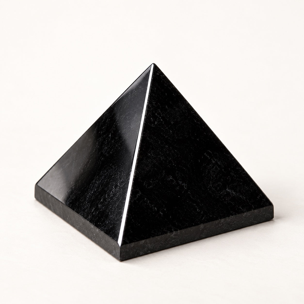 Omnivedic polished Shungite Obsidian pyramid, studio view